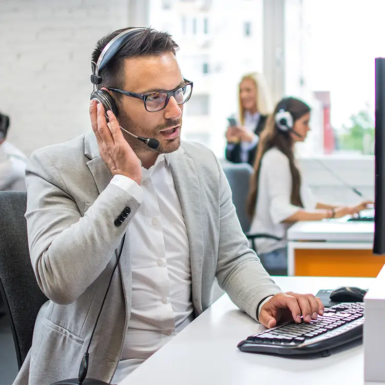 a man on a 24/7 hone line with employer advice receiving ACAs advice.