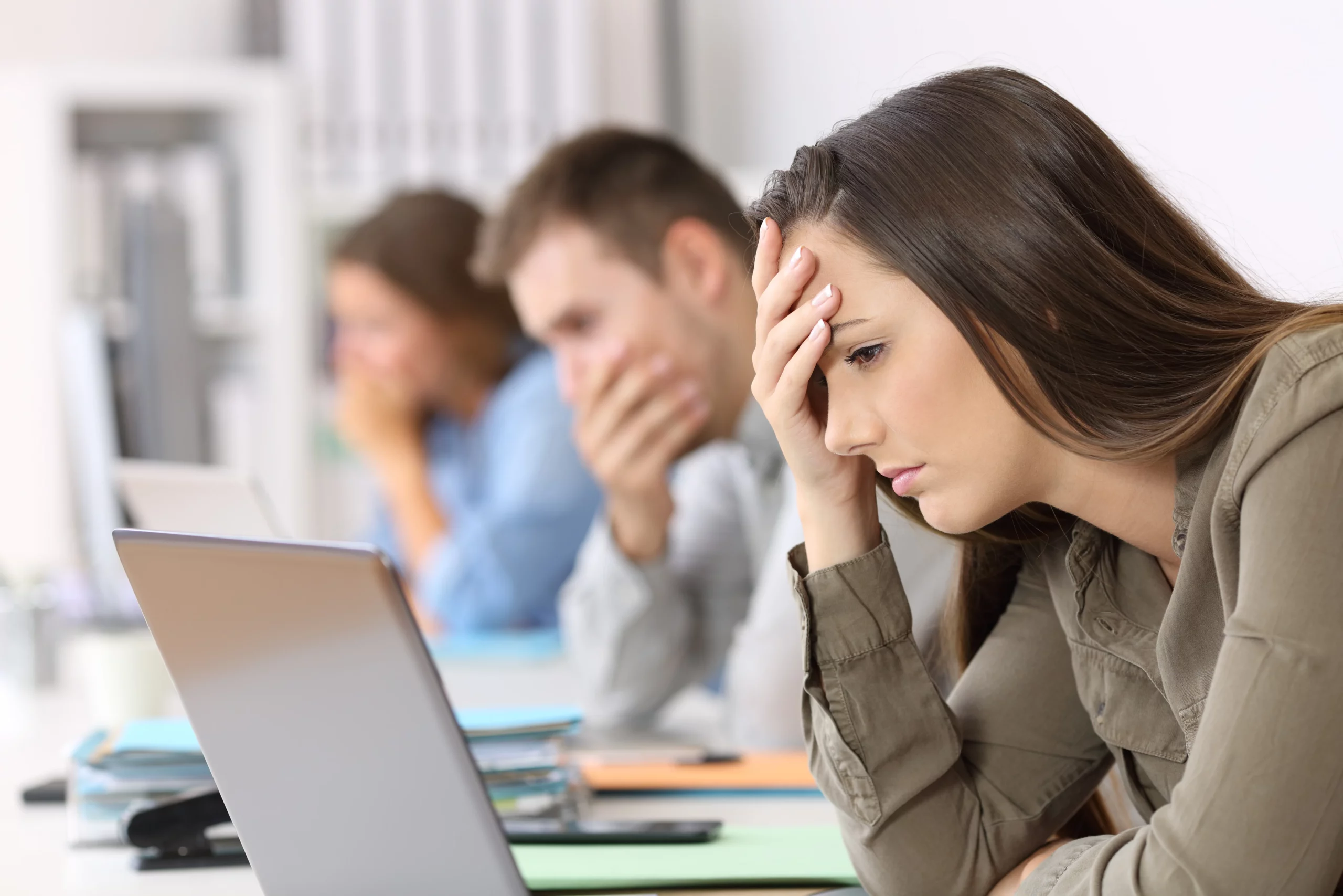 A lady using a redundancy calculator to work out how much statutory redundancy pay employees get. 