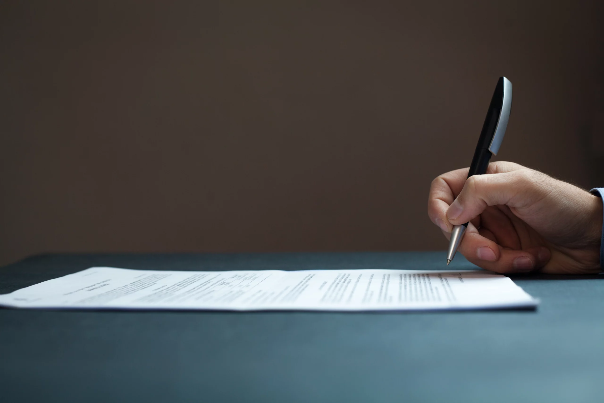 an employer signing a dismissal letter 