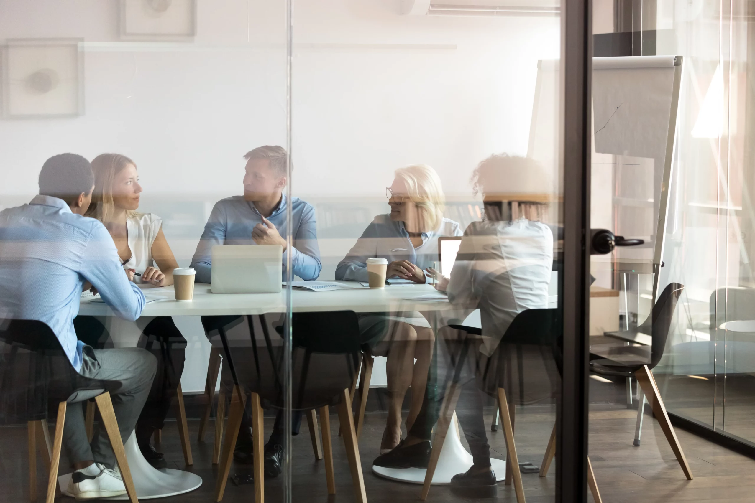 A incoming employer talking to the transferred employees about employee liability information 