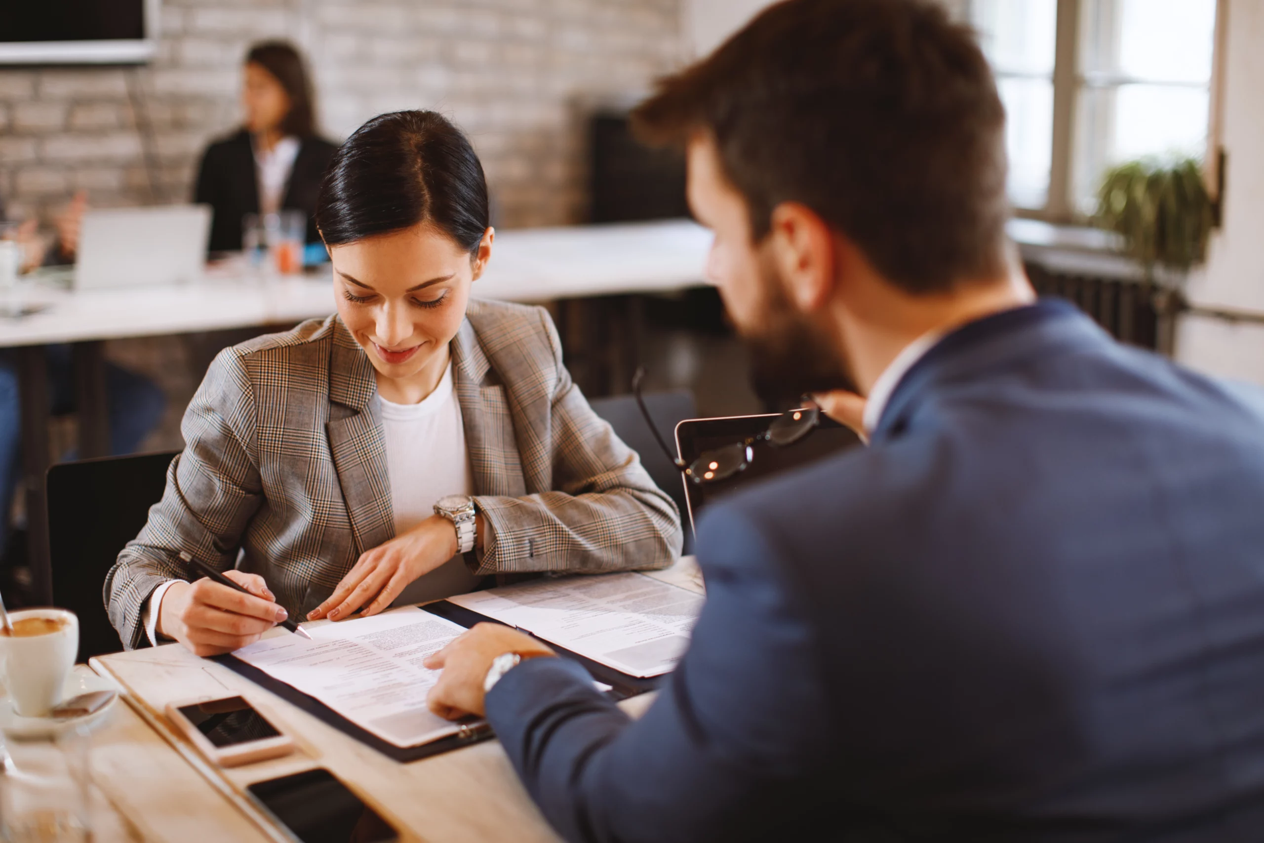 Employee signs contract for agreement between an employer