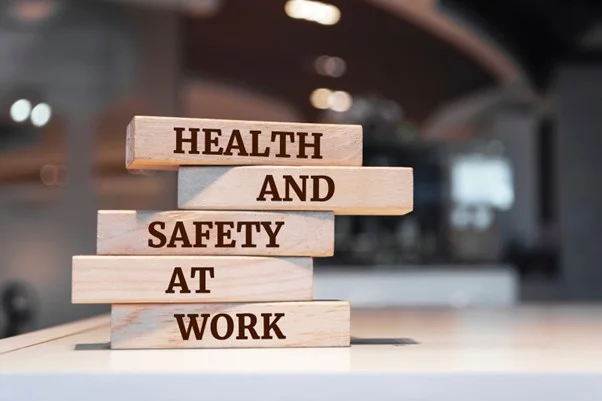 Health and safety at work displayed on a table as additional measures.