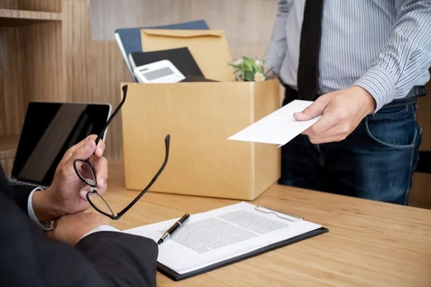 An employee handing in his notice after being forced to quit due to an employers breach of contract. 