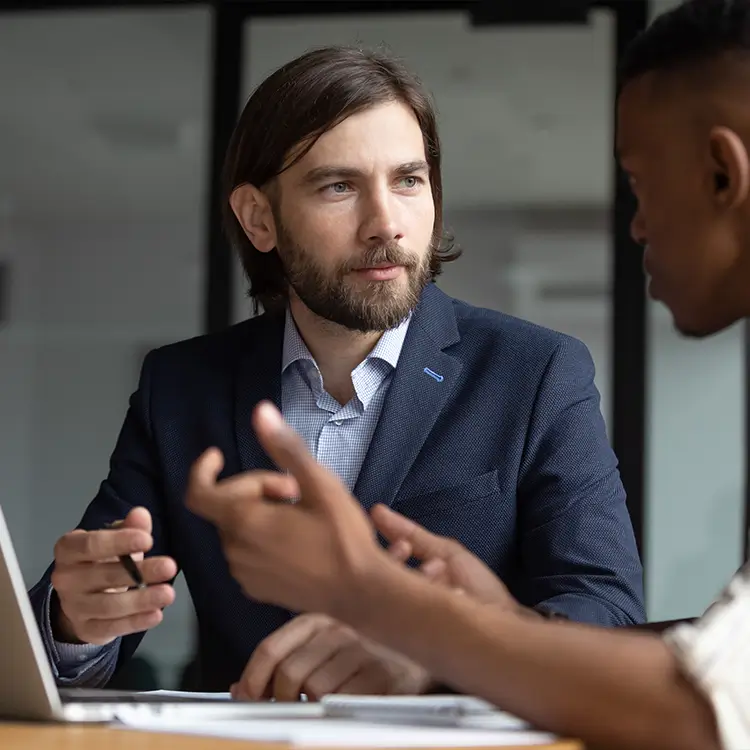 a business owner looking at employment contracts