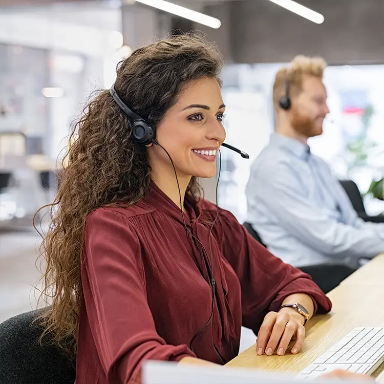 A lady on the employer helpline speaking to an employer about their employment law issues