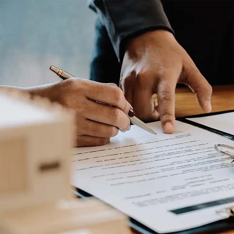 an employer showing the employee where to sign on their employment contract that is compliant with the acas code of practice.